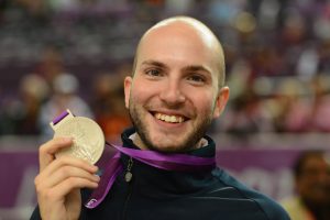 LONDON, ENGLAND - JULY 30: Silver medallist Niccolo Campriani of Italy poses with the silver medal won in the Men's 10m Air Rifle Shooting final final on Day 3 of the London 2012 Olympic Games at The Royal Artillery Barracks on July 30, 2012 in London, England. (Photo by Lars Baron/Getty Images)